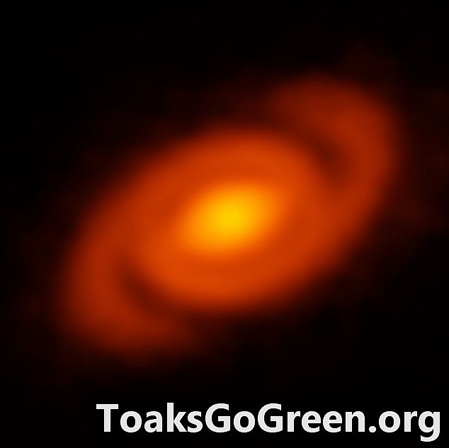 Un système solaire en formation avec des bras en spirale - Autre